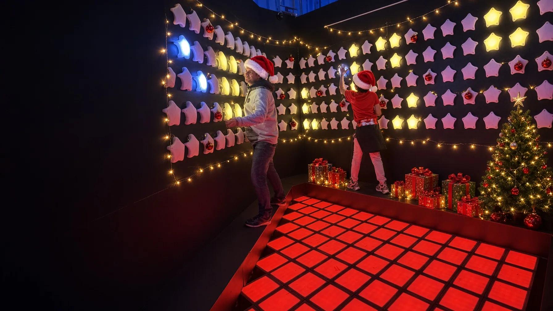 Christmas party playing interactive challenges at Pixel Pulse Play